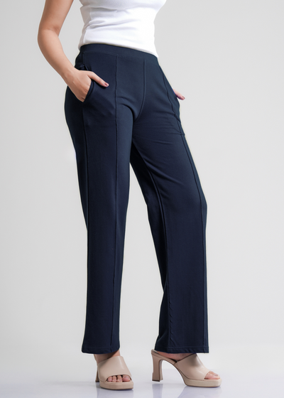 bawełniane spodnie plisowane o szerokich nogawkach,