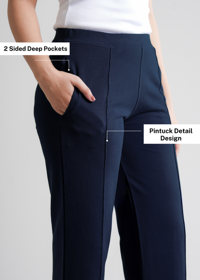 bawełniane spodnie plisowane o szerokich nogawkach,